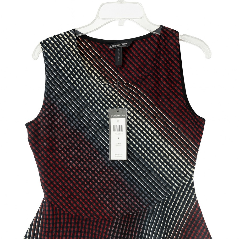 BCBG Stripe Peplum Top – NWT